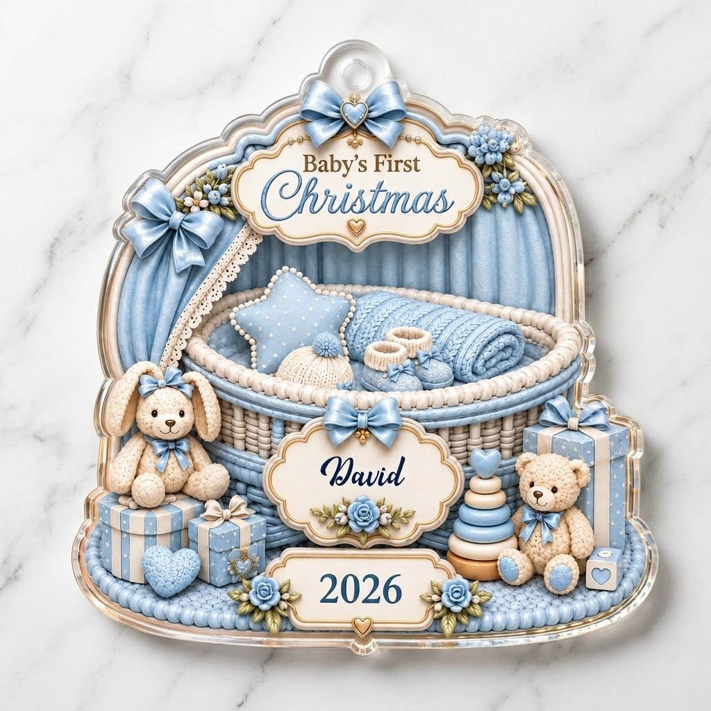 Clear acrylic ornament with blue nursery bassinet, bunny, teddy, and Baby's First Christmas with name and year.