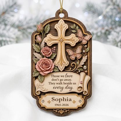Ornate arch wood ornament with carved cross, roses, butterflies and memorial quote with name and dates.