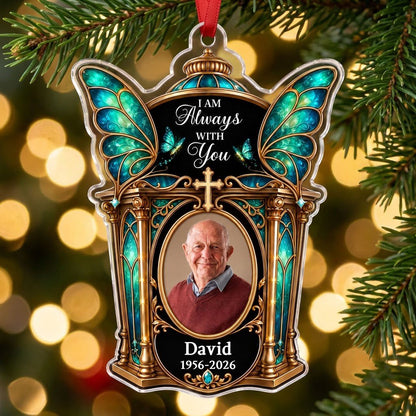 Clear acrylic ornament with winged shrine, teal butterfly wings, cross, oval photo, and 'I AM Always WITH You'.
