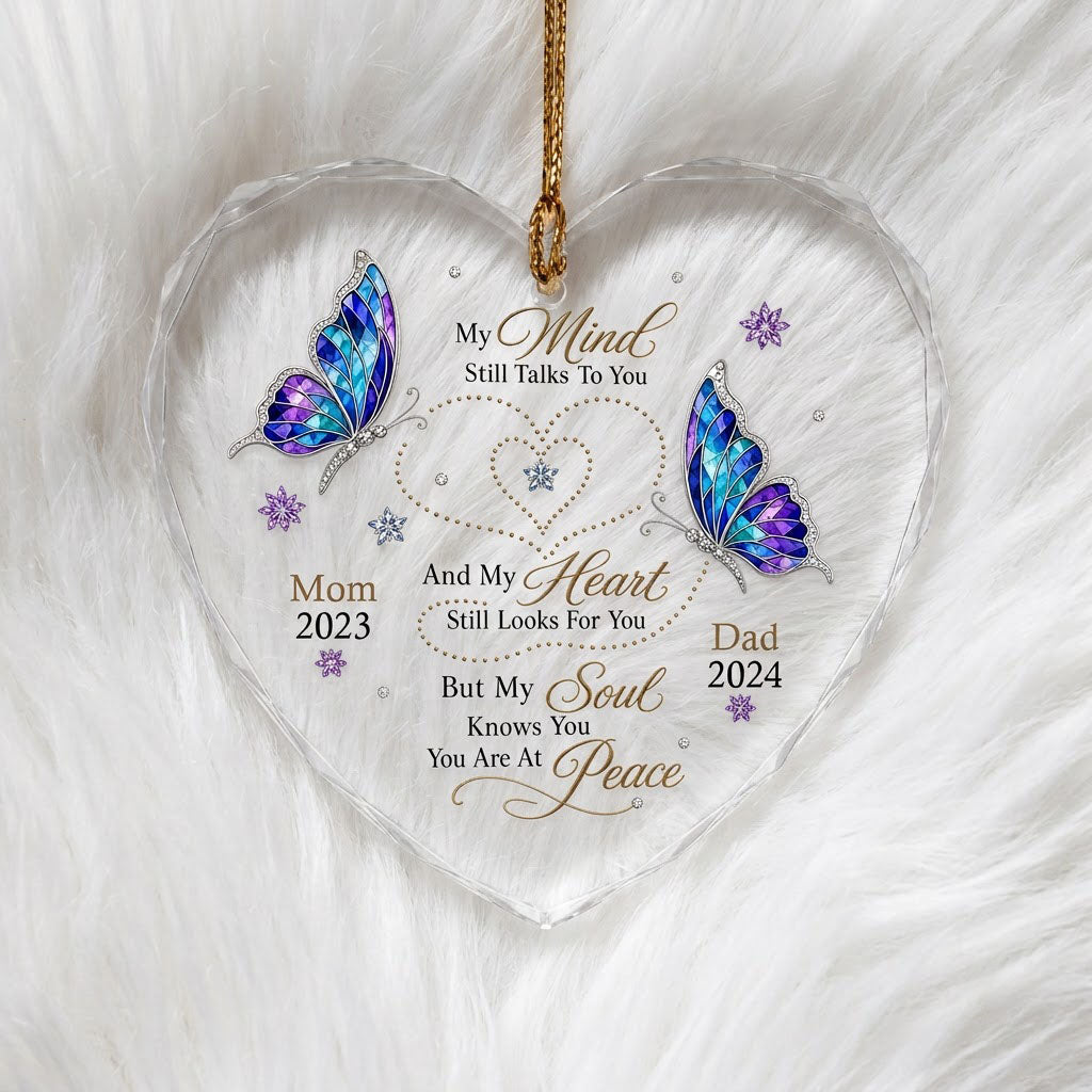 Heart glass ornament with two stained-glass butterflies, dotted heart trails, snowflakes, and a memorial quote.