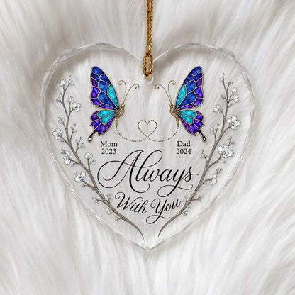 Heart-shaped glass ornament with stained-glass butterflies, gold dotted heart, and white-flower vines.
