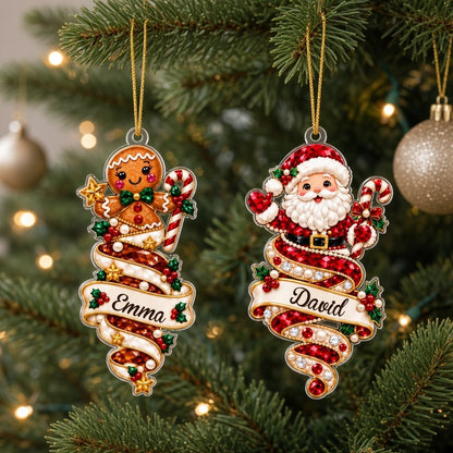 Custom acrylic ornament with a cute elf and smiling snowman on jeweled swirl banners with personalized names