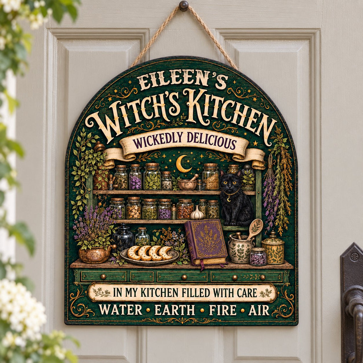 Arch wooden sign with black cat, apothecary jars, lavender, crescent moon and stars, and the text WITCH'S KITCHEN.