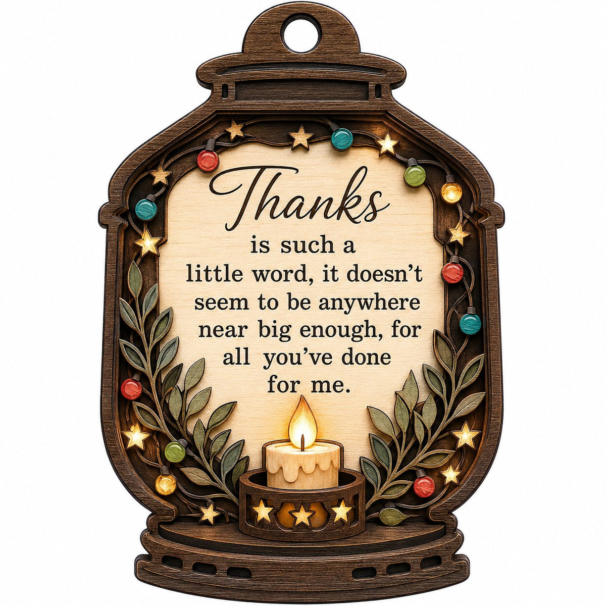 Lantern-shaped wood ornament with candle, colorful fairy lights, leafy branches, and a thank-you quote.