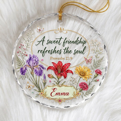 Round faceted glass ornament with florals, gold accents, butterflies, and 'A sweet friendship refreshes the soul'.