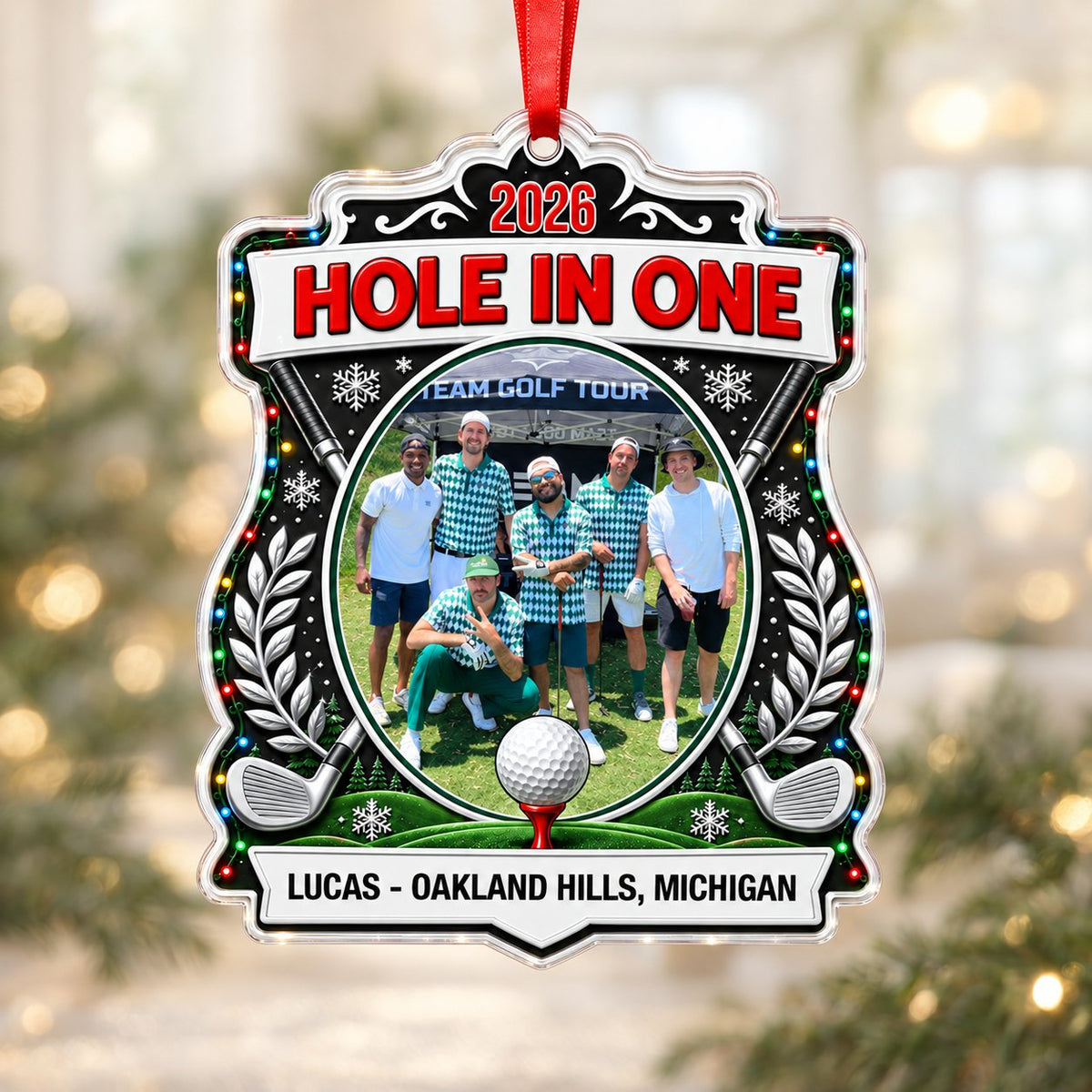 Acrylic crest ornament with golf photo, crossed clubs, Christmas lights, snowflakes, and HOLE IN ONE 2026 text.