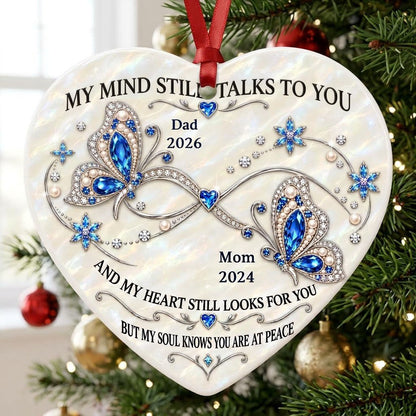 Heart ceramic ornament with blue jeweled butterflies, a silver infinity, and quote 'My Mind Still Talks To You'.