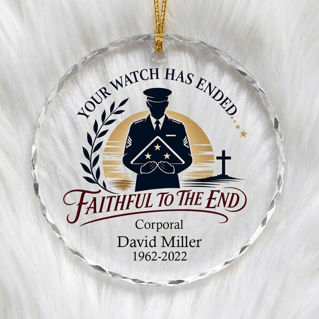 Round glass ornament with officer silhouette holding a folded flag, golden sunset, cross, and the words YOUR WATCH HAS E