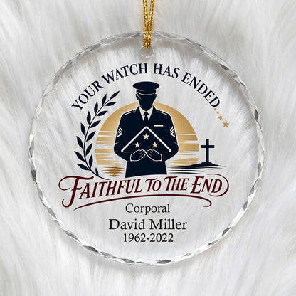 Round glass ornament with officer silhouette holding a folded flag, golden sunset, cross, and the words YOUR WATCH HAS E