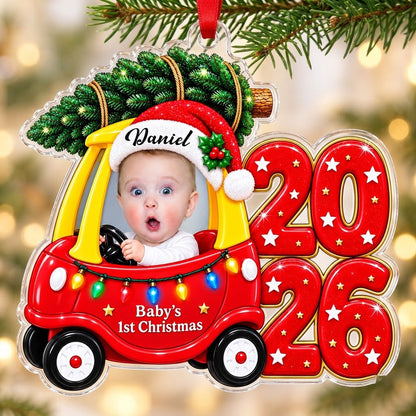 Acrylic ornament shaped like a toy car with tree, Baby's 1st Christmas text, lights, and a baby photo.