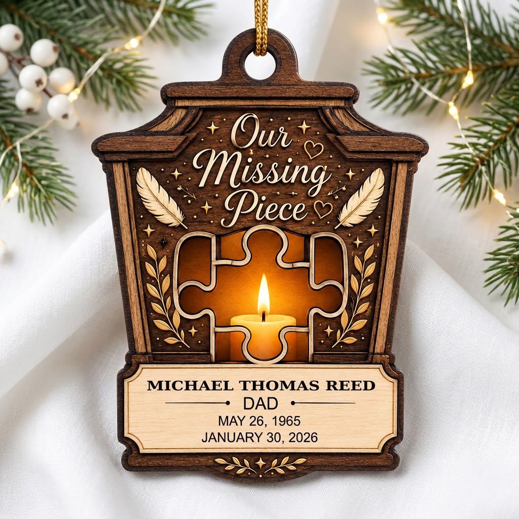 Wood ornament with lantern-style frame, puzzle-piece cutout revealing candle glow, “Our Missing Piece” text and feather 