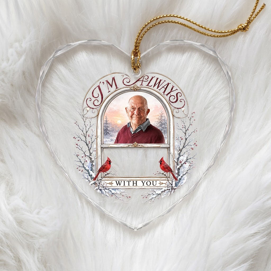 Heart-shaped glass ornament with red cardinals, arched photo window, and I'M ALWAYS WITH YOU text on a snowy winter scen