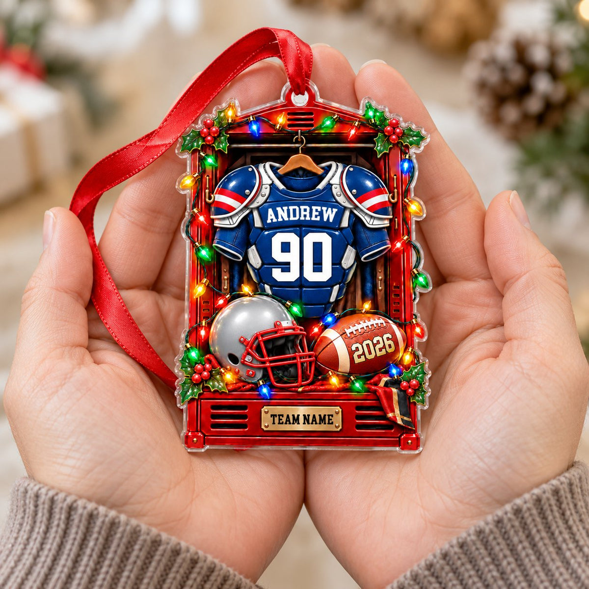 Acrylic ornament shaped like a football locker with jersey, helmet, football, lights and holly, personalized for a playe