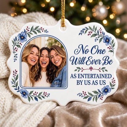 Blue floral ceramic ornament with navy photo frame and the text No One Will Ever Be As Entertained By Us As Us.