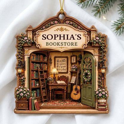 Arched storefront wood ornament with a cozy bookstore diorama and "BOOKSTORE" text, personalized with a name.