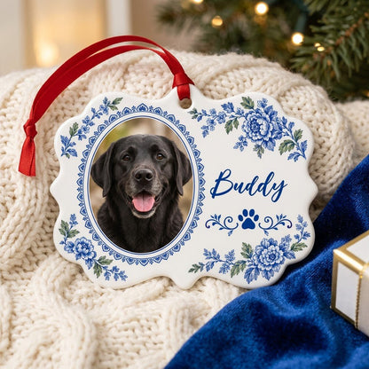Scalloped medallion ornament with blue-green Delft floral border, dog photo left, blue paw print and name Buddy