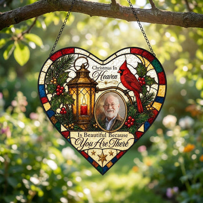 Heart stained glass suncatcher with lantern, red candle, red cardinal, holly, pine, and an oval photo frame.