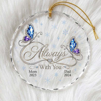 Round glass ornament with blue and purple jeweled butterflies, silver infinity heart, and light blue snowflakes.