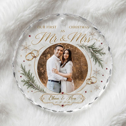 Round glass ornament with couple photo, gold wedding rings, snowflakes and 'OUR FIRST CHRISTMAS AS Mr & Mrs'.