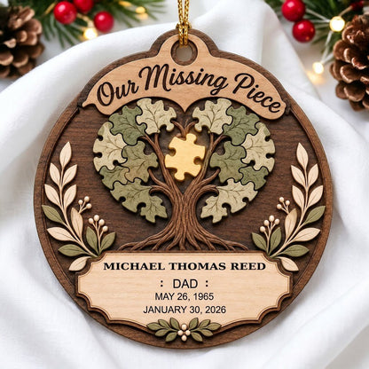 Round wood ornament displays “Our Missing Piece” with a puzzle-piece family tree and a gold missing piece at the center.