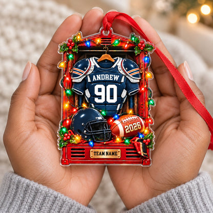 A red sports locker ornament with a football jersey, helmet, ball, holly, and Christmas lights on a custom-cut acrylic s