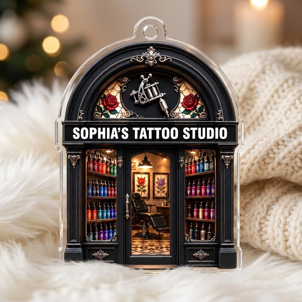 Arched black storefront tattoo ornament with silver machine, stained-glass roses, ink bottles, and a 'TATTOO STUDIO' sig