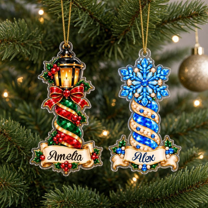 Acrylic ornament with green gift box and smiling elf, jeweled spiral columns, holly, and a name banner.