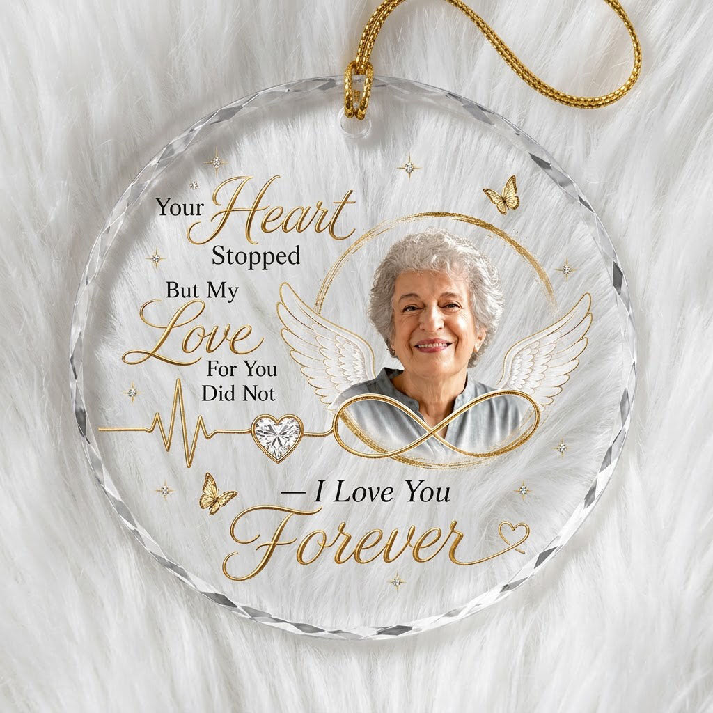 Round ornament with angel wings, photo circle, infinity symbol, heartbeat line to heart, and butterflies.