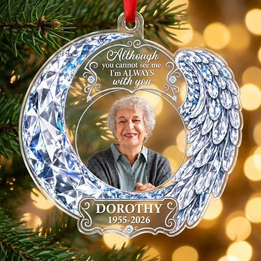 Acrylic ornament with blue crystal-look crescent moon, angel wing, circular photo frame and memorial quote.