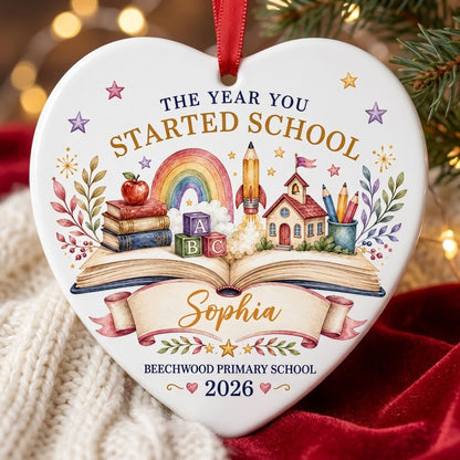 Heart ceramic ornament with an open book, rainbow, schoolhouse, ABC blocks and banner for name, school and year