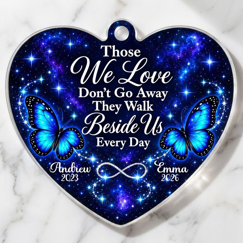 Heart acrylic ornament with blue butterflies, starry galaxy background, and the memorial quote with name and year.