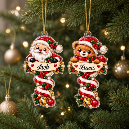 Custom-cut acrylic ornament with Santa or penguin holding a name banner on a red-and-white candy cane.