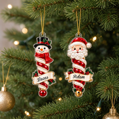 Custom-cut clear acrylic ornaments: a Christmas tree finial and a Mrs. Claus finial with cream name banners.