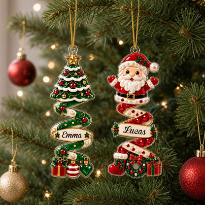 Custom-cut acrylic ornament with a ribbon tree or snowman on a spiral ribbon, personalized with a name on the ribbon.