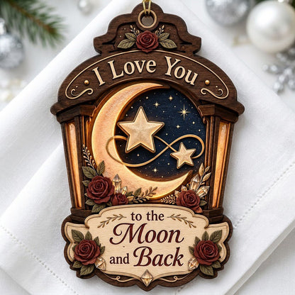 Wood ornament with red roses, crescent moon and stars on a night sky, and the phrase I Love You to the Moon and Back.
