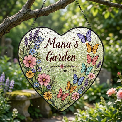 Heart stained-glass suncatcher with floral border, colorful butterflies, and 'Mana's Garden' with kids' names.