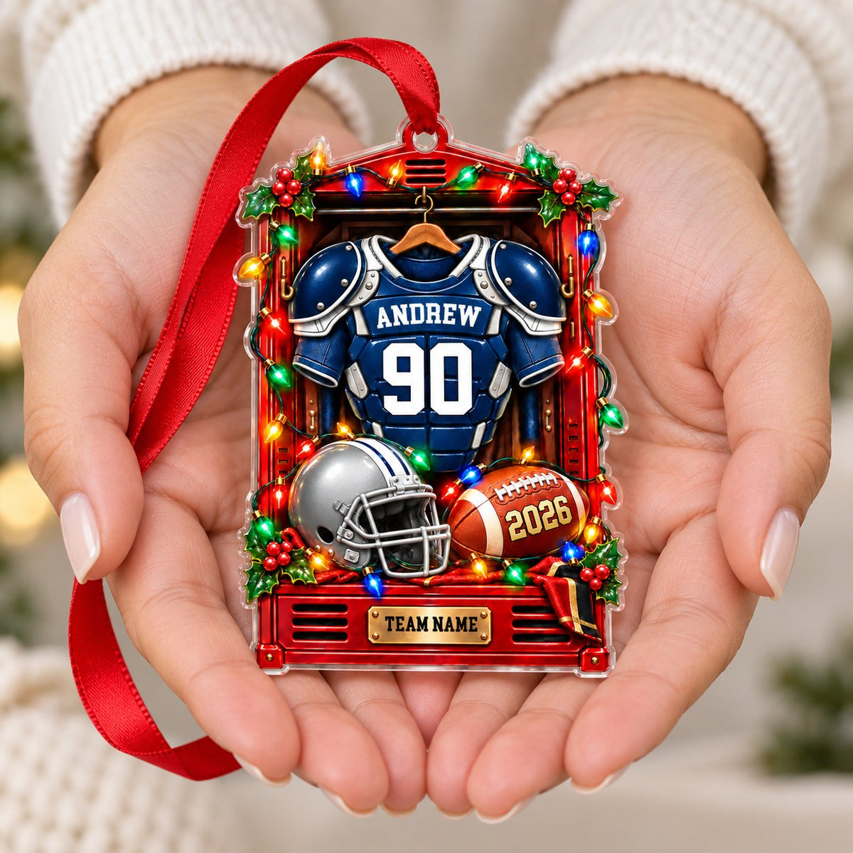 Red locker acrylic ornament with blue-and-white football jersey, silver helmet, football, lights and holly.