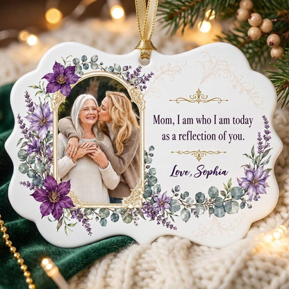 Gold frame photo with purple clematis and the quote 'Mom, I am who I am today as a reflection of you.'