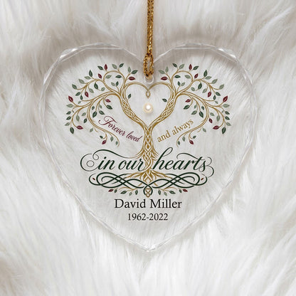 Heart glass ornament with a golden tree of life and the text 'Forever loved and always in our hearts'.