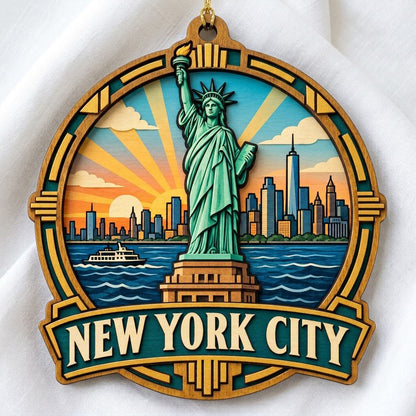 Wood ornament with Statue of Liberty, NYC skyline, ferry and sunrays in an Art Deco frame reading NEW YORK CITY.