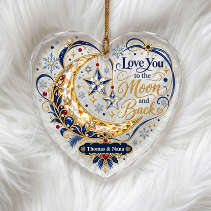 Heart glass ornament with jeweled gold crescent moon, blue hanging stars, and 'Love You to the Moon and Back' text.