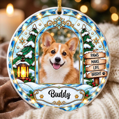 Round ceramic ornament with blue and gold stained-glass border, dog photo center, snow tree, gold lantern, holly, signpo