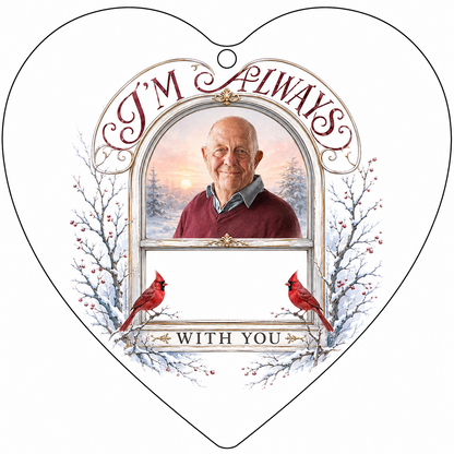 Heart-shaped glass ornament with red cardinals, arched photo window, and I'M ALWAYS WITH YOU text on a snowy winter scen