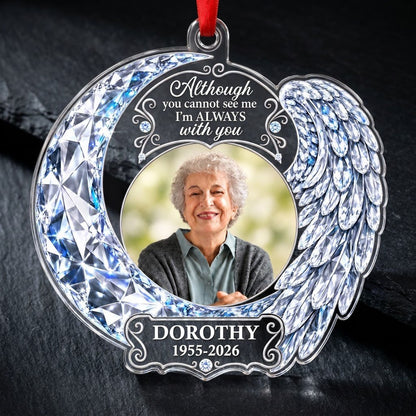 Acrylic ornament with blue crystal-look crescent moon, angel wing, circular photo frame and memorial quote.