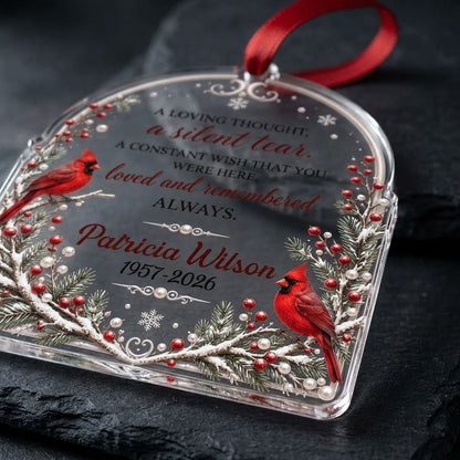 Clear acrylic arch ornament with two red cardinals, snowy evergreens, memorial verse, plus personalized name and dates.