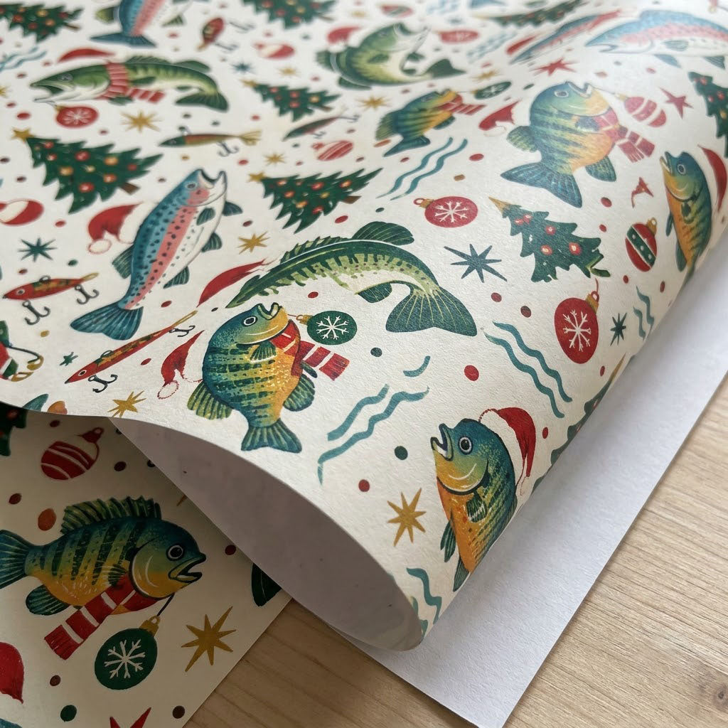 Wrapping paper with fish in Santa hats and scarves, trees, ornaments, lures, stars and blue wavy lines