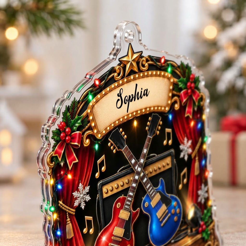 Custom-cut acrylic ornament with crossed red and blue guitars, Merry Christmas marquee, curtains and holly.