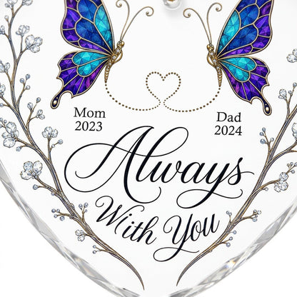 Heart-shaped glass ornament with stained-glass butterflies, gold dotted heart, and white-flower vines.
