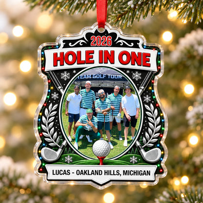 Acrylic crest ornament with golf photo, crossed clubs, Christmas lights, snowflakes, and HOLE IN ONE 2026 text.