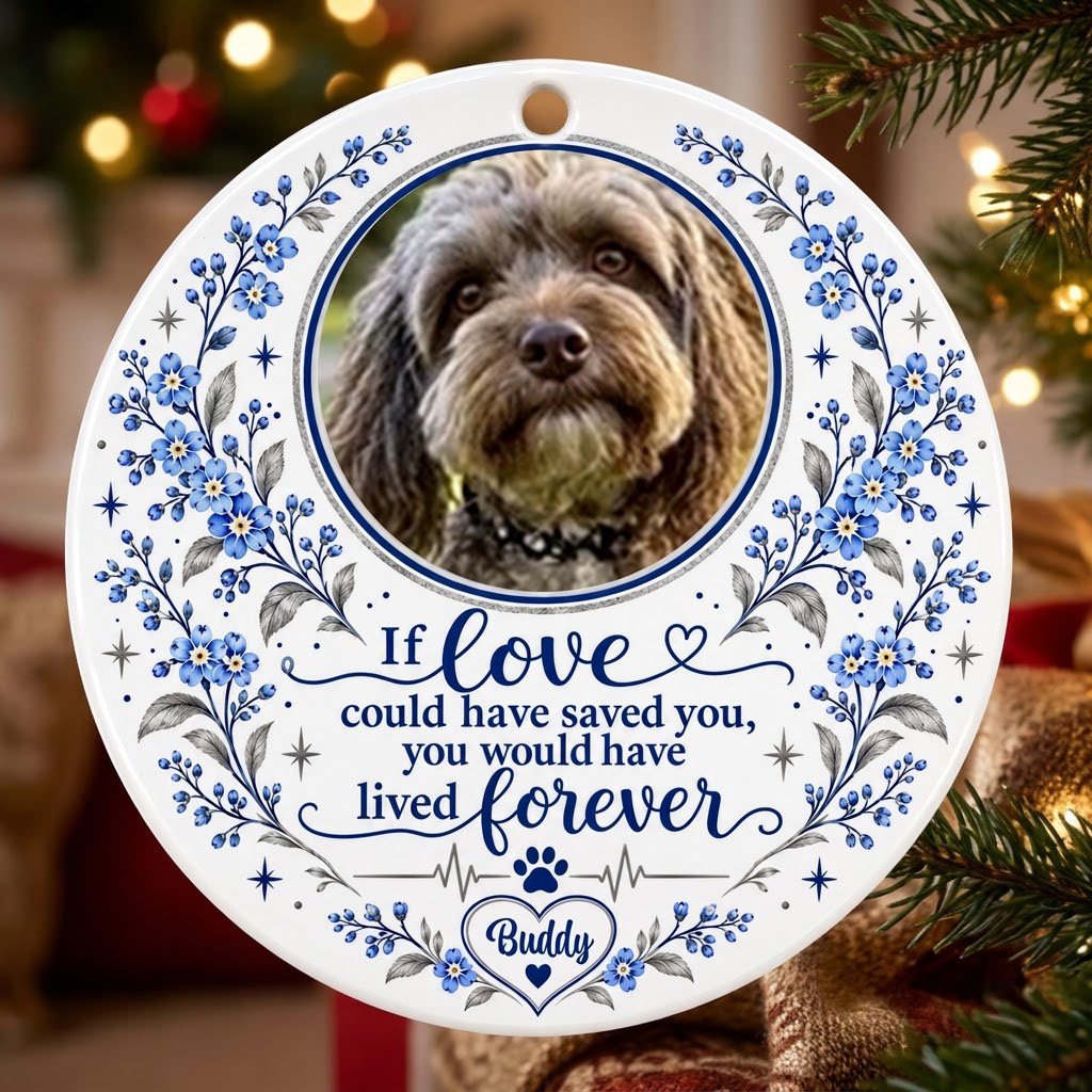 Round ceramic ornament with pet photo, blue forget-me-not florals, paw heartbeat line, and memorial quote.